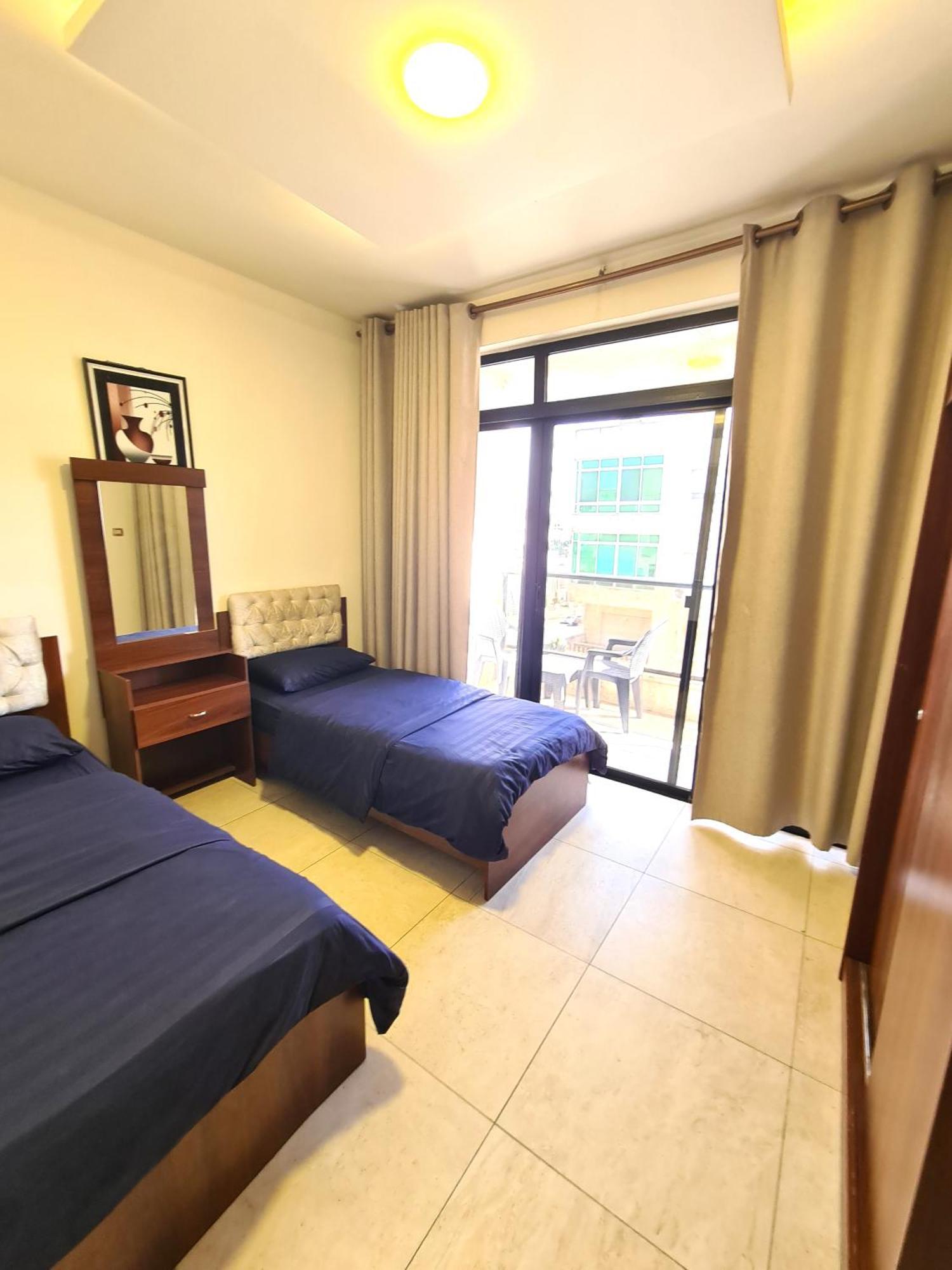 Dair Ghbar Gate Apartments Amán Habitación foto